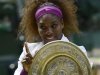 Serena Williams of the U.S. holds her trophy after defeating Agnieszka Radwanska of Poland in their women's final tennis match at the Wimbledon tennis championships in London