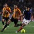 Egypt's al-Ahly forward Ismail vies for the ball against Esperance de Tunis' forward Zouaghi during their CAF final soccer match near Tunis