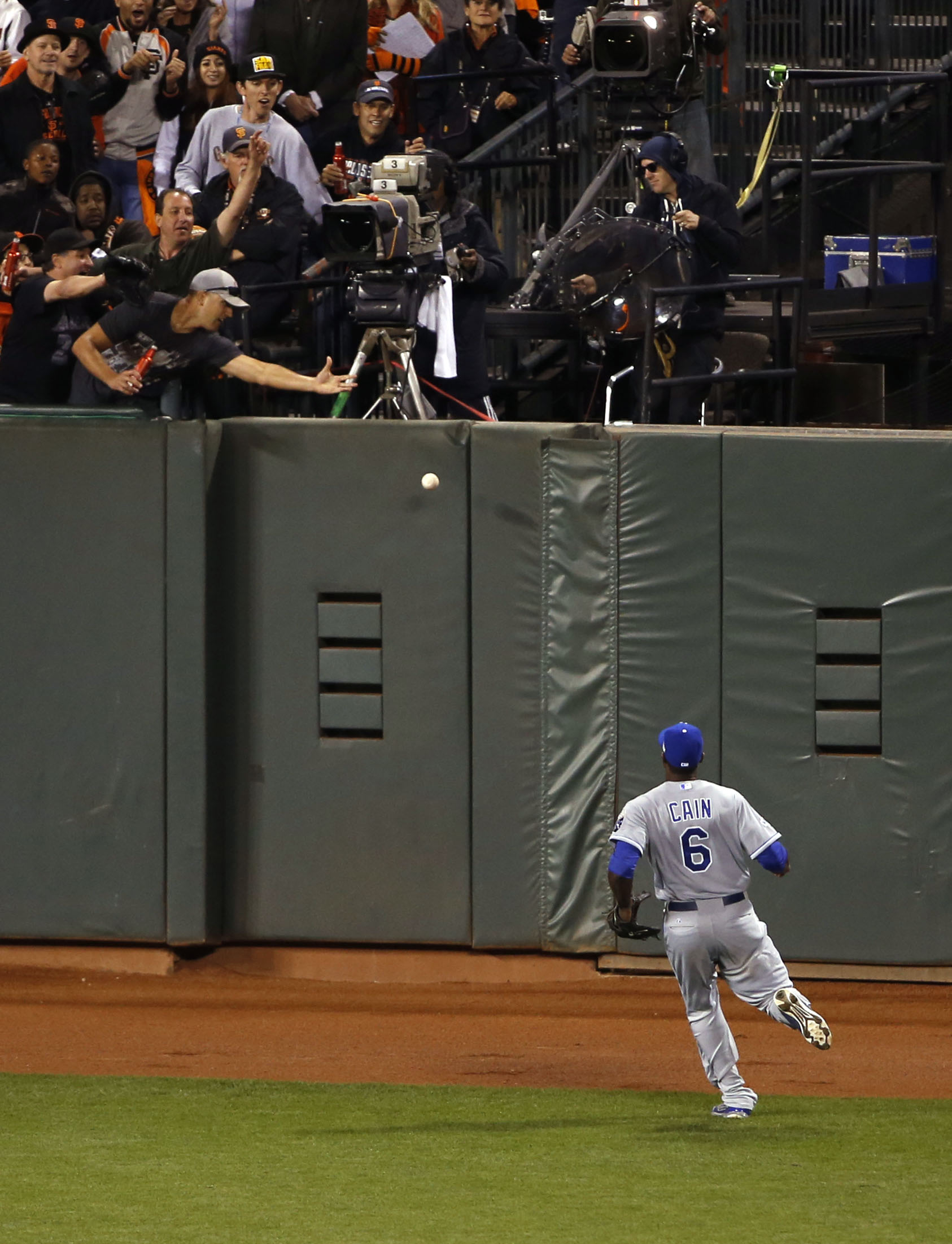 Lorenzo Cain could only watch Juan Perez's double hit off the wall. (USA Today)