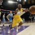 Los Angeles Lakers guard Kobe Bryant (24) chases a loose ball against the New Orleans Hornets in the first half of an NBA basketball game in Los Angeles Tuesday, April 9, 2013.  (AP Photo/Reed Saxon)