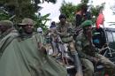 Democratic Republic of Congo Army soldiers on November 5, 2013 at the foot of Chanzu hill, 80 kilometres north of regional capital Goma, in the eastern North Kivu region that was one of the M23 rebels' last stands