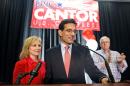 Congressman Eric Cantor, R-Va., stands beside his wife Diana, left, and delivers a concession speech at his election night party in Richmond, Va., Tuesday, June 10, 2014. Cantor lost the GOP primary to tea party candidate Dave Brat. (AP Photo/Steve Helber)