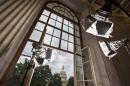 television news lights await the start of activity on Capitol Hill in Washington