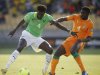 Ivory Coast's Kolo Toure challenges Togo's captain Emmanuel Adebayor during their African Nations Cup (AFCON 2013) Group D soccer match in Rustenburg