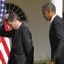 File photo of U.S. President Barack Obama walking off stage with Treasury Secretary Tim Geithner after speaking in the Rose Garden of the White House in Washington