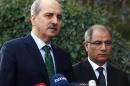 Turkish Deputy Prime Minister Numan Kurtulmus (L), pictured in January 2016, said it would be "militarily and strategically" smart to follow the current anti-Islamic State operation in Mosul with an anti-IS operation in Raqa