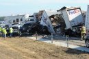 Cars and Trucks are piled on Interstate 10 in Southeast Texas Thursday Nov. 22, 2012. The Texas Department of Public Safety says at least 35 people have been injured in a more than 50-vehicle pileup. (AP Photo/The Beaumont Enterprise, Guiseppe Barranco)