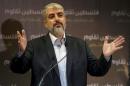 Hamas leader Meshaal talks during a news conference in Doha