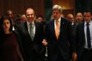 US Secretary of State John Kerry (R) and Russian Minister for Foreign Affairs Sergei Lavrov (L) speak as they arrive prior to a meeting to discuss the Syrian crisis on September 9, 2016, in Geneva