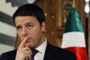 Italian Prime Minister Matteo Renzi addresses a news conference at the Government Palace in Tunis