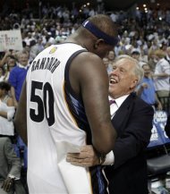 FILE - In this April 23, 2011 file photol, Memphis Grizzlies owner Michael Heisley, right, congratulates forward Zach Randolph (50) after the Grizzlies defeated the San Antonio Spurs in Game 3 of a first-round NBA basketball series in Memphis, Tenn. Heisley finally may have found a buyer for his NBA team. The majority owner of the Grizzlies told The Commercial Appeal Monday, June 11, 2012, that he has talked with billionaire Robert Pera but there is no contract "at this point." (AP Photo/Lance Murphey, file)