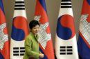 South Korean President Park Geun-hye arrives for the meeting with Cambodian Prime Minister Hun Sen at the presidential Blue House in Seoul on December 13, 2014