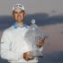 Michael Thompson holds the trophy after winning the Honda Classic golf tournament, Sunday, March 3, 2013 in Palm Beach Gardens, Fla. (AP Photo/Wilfredo Lee)