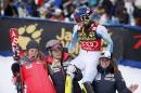 United States' Mikaela Shiffrin, second from right, celebrates after finishing her second run during the women's World Cup slalom ski race Sunday, Nov. 29, 2015, in Aspen, Colo. (AP Photo/Brennan Linsley)