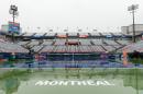 Rain covers center court on day one of the WTA Rogers Cup, at Uniprix Stadium in Montreal, Quebec, on July 25, 2016