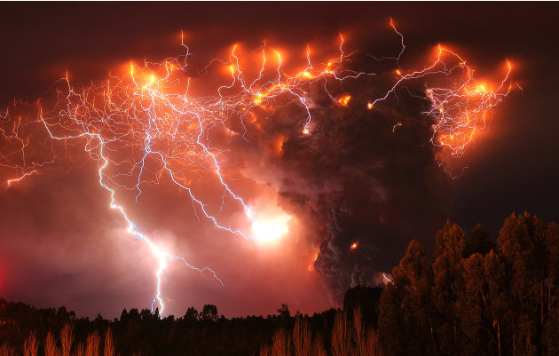 Lightning strikes over the Puyehue volcano, over 500 miles south of Santiago, Chile, Monday June 6, 2011.  Authorities have evacuated about 3,500 people in the nearby area. The volcano was calm on Mon