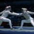 FILE - In this Aug. 12, 2012 file photo Italy's Irene Vecchi, left, competes with Britain's Sophie Williams during women's individual sabre fencing at the 2012 Summer Olympics in London. The inaugural European Games in Baku in 2015 have been approved. The European Olympic Committees voted Saturday, Dec. 8, 2012 to create the multi-sport event in June 2015. The capital of Azerbaijan was the sole candidate. The secret ballot passed with 38 in favor, eight against and three abstaining. (AP Photo/Andrew Medichini, File)