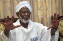 Leading Sudanese opposition figure Hassan al-Turabi gestures during an interview in Khartoum October 3, 2012.REUTERS/Stringer
