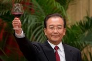 China's Premier Wen Jiabao, seen here raising his glass as he makes a toast during the 63rd National Day reception at the Great Hall of the People, on September 29. The relatives of Wen have controlled assets worth at least $2.7 billion, the New York Times said in a report likely to further embarrass the Communist Party ahead of its power handover