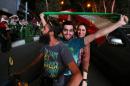 Iranians celebrate in northern Tehran on July 14, 2015 after the country's nuclear negotiating team struck a deal with world powers in Vienna