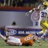 LSU running back Jeremy Hill (33) runs past Clemson defensive back Xavier Brewer (9) during the first half of the Chick-fil-A Bowl NCAA college football game, Monday, Dec. 31, 2012, in Atlanta. (AP Photo/David Goldman)