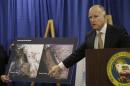 Gov. Jerry Brown points to images showing the snow depth in the Sierra mountains on Jan. 13, 2013, left, and Jan. 13, 2014, center, while declaring a drought state of emergency in San Francisco, Friday, Jan. 17, 2014. With a record-dry year, reservoir levels under strain and no rain in the forecast, California Gov. Jerry Brown formally proclaimed the state in a drought Friday, confirming what many already knew. Brown made the announcement in San Francisco amid increasing pressure in recent weeks from the state's lawmakers, including Democratic Sen. Dianne Feinstein. (AP Photo/Jeff Chiu)
