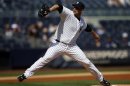 Yankees' Pettitte throws against the Blue Jays during the first inning of their MLB American League baseball game in New York