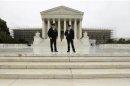 Policemen talk in front of the U.S. Supreme Court in Washington