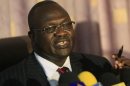 SSouth Sudan's Vice President Riek Machar speaks during a news conference after meeting north Sudan's Vice President Ali Osman Mohamed Taha in Khartoum