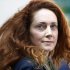 Rebekah Brooks, former chief executive of News International, leaves Westminster Magistrates' Courts after she was granted bail on charges of attempting to cover up tabloid phone-hacking, London, Wednesday, June 13, 2012. (AP Photo/Sang Tan)