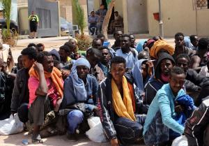 Migrants from sub-Saharan Africa sit in a center for&nbsp;&hellip;