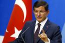 Turkey's Prime Minister Davutoglu speaks during a news conference at his ruling AK Party headquarters in Ankara