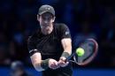 Britain's Andy Murray returns against Japan's Kei Nishikori during their round robin stage men's singles match on day four of the ATP World Tour Finals tennis tournament in London on November 16, 2016
