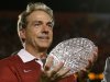 Alabama head coach Nick Saban holds The Coaches Trophy after the BCS National Championship college football game against Notre Dame Monday, Jan. 7, 2013, in Miami. Alabama won 42-14. (AP Photo/David J. Phillip)