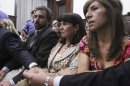 Susana Trimarco, second from right, is comforted by friends and lawyers as they listen to the verdict during the trial of the alleged kidnappers of her daughter Marita Veron in San Miguel de Tucuman, Argentina, Tuesday, Dec. 11, 2012. The 13 defendants, who were charged with kidnapping and forcing Veron to be a prostitute in 2002, were found innocent. (AP Photo/Atilio Orellana)