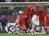 Czech Republic's Plasil shoots a free kick towards Russia's defensive barrier during their Group A Euro 2012 soccer match at the City Stadium in Wroclaw