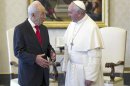 Pope Francis talks with Israeli President Shimon Peres during a private meeting at the Vatican