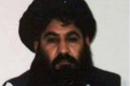 This handout photograph released by The Afghan Taliban on December 3, 2015, which was taken on a mobile phone in mid-2014 is said to show Afghan Taliban leader Mullah Akhtar Mansour posing for a photograph at an undisclosed location in Afghanistan
