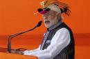 Modi addresses his supporters during a rally in Itanagar
