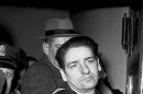 FILE - In this Feb. 25, 1967 file photo self-confessed Boston Strangler Albert DeSalvo is seen minutes after his capture in Boston. Authorities say DNA tests on the remains of DeSalvo confirm he killed Mary Sullivan, the woman believed to be the serial killer's last victim. DeSalvo admitted to killing Sullivan and 10 other women in the Boston area between 1962 and 1964 but later recanted. He was later killed in prison. (AP Photo, File)
