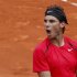 Nadal of Spain reacts during his match against Schwank of Argentina during the French Open tennis tournament at the Roland Garros stadium in Paris