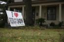A sign is seen in the front yard of a home in Ferguson, Missouri