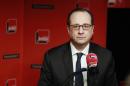 French President Francois Hollande prepares to answer a reporter's question during a live interview on French radio station France Inter in Paris Monday, Jan. 5, 2015. (AP Photo/Remy de la Mauviniere/Pool)
