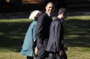 U.S. President Barack Obama walks the grounds of the Kingsmill Resort in Williamsburg