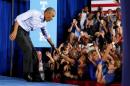 Obama turns focus to U.S. Congress as he campaigns for Clinton