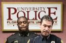 Tallahassee police chief Michael DeLeo, right, and Florida State police chief David Perry speak at a news conference concerning the on-campus shooting on Thursday, Nov. 20, 2014, in Tallahassee, Fla. (AP Photo/Steve Cannon)