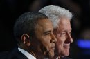 President Barack Obama stands with Former President Bill Clinton after Clintons' address to the Democratic National Convention in Charlotte, N.C., on Wednesday, Sept. 5, 2012. (AP Photo/Carolyn Kaster)