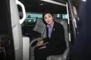 Thailand's Prime Minister Yingluck Shinawatra leaves the Government Complex after a meeting with the Election Commission in Bangkok
