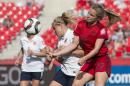 Norway's Elise Thorsnes (L) and Germany's Tabea Kemme fight for the ball during their Group B match at the 2015 FIFA Women's World Cup at Lansdowne Stadium in Ottawa, June 11, 2015