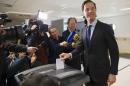 Dutch PM Rutte casts his vote for the consultative referendum on the association between Ukraine and the European Union, in the Hague